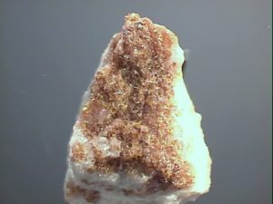 "Burbankite mineral specimen on display"





