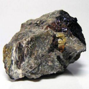 "Canasite: Vibrant green gemstone promoting emotional balance and spiritual growth."