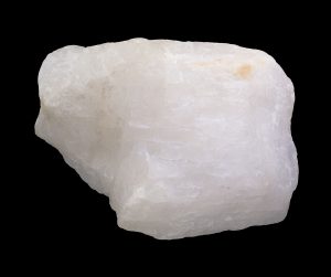 "Icy white cryolite mineral specimen."





