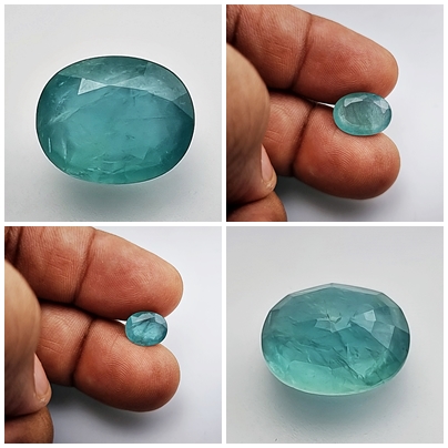 Grandidierite gemstone on white background.