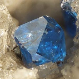 Hauyne gemstone with intense blue hue.
