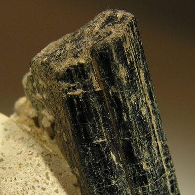 Dark mineral grains in igneous rock