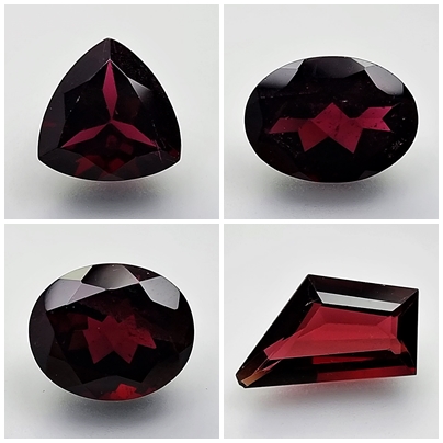Rhodolite Garnet: Deep red gemstone with purple undertones.
