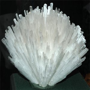 Scolecite mineral specimen with delicate crystals.