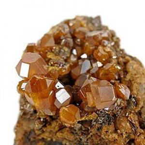 Stolzite mineral sample, yellow-brown, with tetragonal crystal structure.