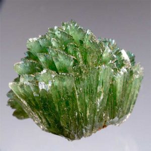 Ludlamite mineral specimen, a gemstone with green hues.