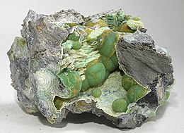 Cluster of green wavellite crystals
