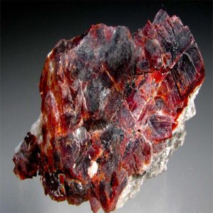 Vibrant red villiaumite mineral specimen