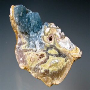 Wardite mineral specimen, pale blue in color