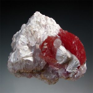 White fibrous xonotlite mineral specimen